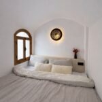 bright-bedroom-with-stylish-decor-and-comfortable-bedding