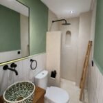 private-bathroom-with-modern-walk-in-shower-and-refined-finishes